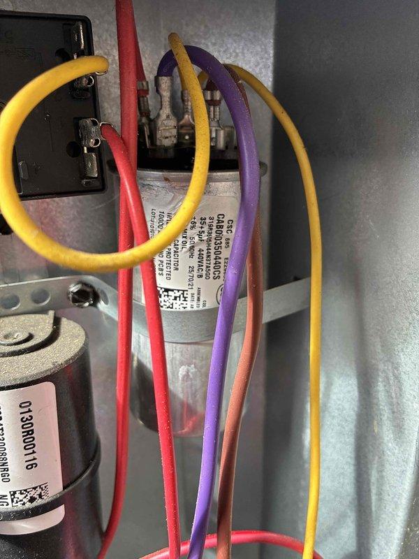 Completed annual cooling maintenance on three-system HVAC installation per recurring service agreement. Performed comprehensive cleaning and inspection of all units, including electrical control panel diagnostics with multimeter readings confirming proper voltage levels at 6.97V on control circuits. Inspected and verified all internal components including capacitors, contactors, relays, and terminal connections for proper operation and secure mounting.