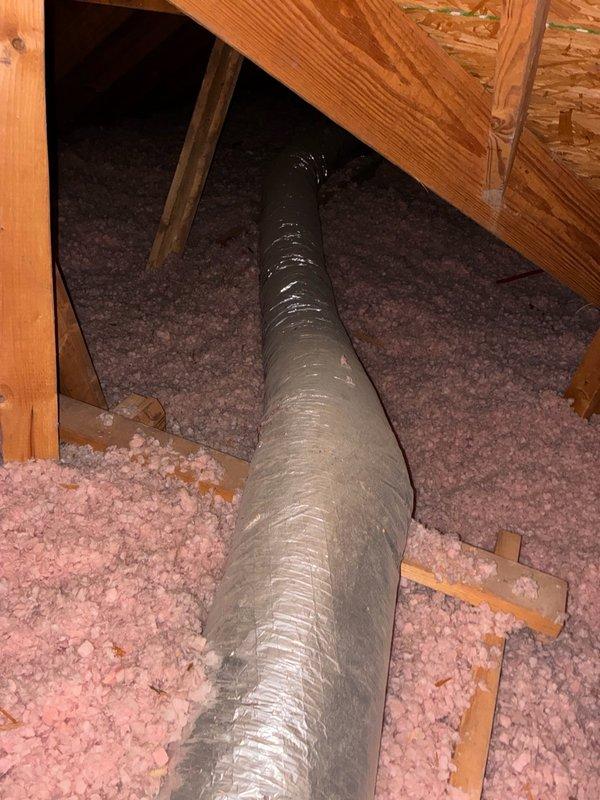 Responded to complaint of inadequate airflow to one side of residence. Performed visual inspection of HVAC ductwork system in attic space. Examined flexible duct runs, insulation integrity, and distribution system serving affected areas. Documented conditions of metallic flex duct, attic insulation, and overall system configuration with photos for member records.