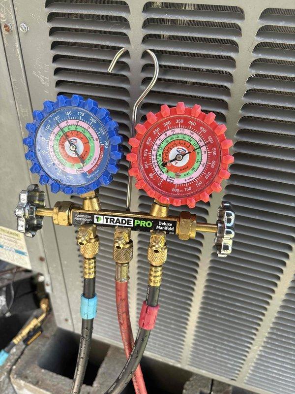 Responded to service call for two separate cooling issues: mini split system that stopped cooling after customer-installed part replacement, and central air conditioning unit failing to reach setpoint temperature. Performed diagnostic evaluation on both systems using manifold gauges to measure refrigerant pressures and assess system performance. Mini split had cooled temporarily following previous repair but ceased operation completely. Central unit unable to maintain desired temperature of 73 degrees, reaching only 82 degrees during daytime operation and 78 degrees at night, with no visible signs of drain pan overflow or refrigerant line freezing on 2-3 year old installation.