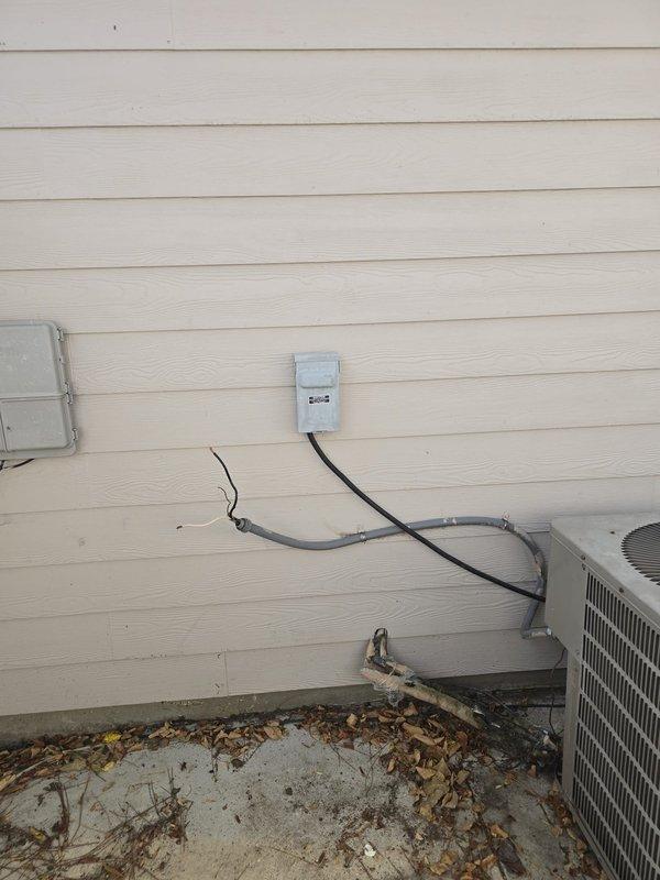 Completed comprehensive estimate for full HVAC system replacement of existing R22 unit. Assessed current outdoor condensing unit mounted on concrete pad with electrical disconnect and refrigerant line routing along exterior wall. Documented existing system configuration including conduit placement, utility connections, and equipment positioning for replacement specifications.