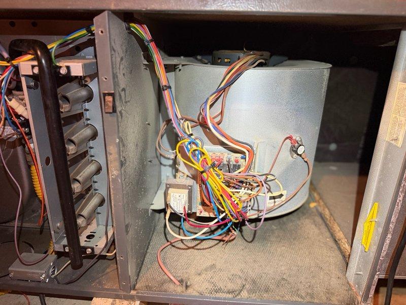 # Install - Small: Wiring Harness Replacement

Completed installation of new wiring harness on HVAC system. Removed existing control panel cover and accessed main electrical compartment to replace deteriorated wiring connections throughout the unit. Disconnected old harness from blower motor assembly, capacitor bank, and control board terminals. 

Routed new pre-fabricated wiring harness through cabinet, ensuring proper wire management and adequate clearance from moving components and heat sources. Connected color-coded wire bundles to appropriate terminals on blower motor, capacitors, and control modules using approved connectors and terminal blocks. Verified all connections were secure and properly seated at junction box and component terminals.

Tested system operation to confirm proper electrical continuity and component function. Reinstalled access panels and restored unit to service. System operating within normal parameters upon completion.