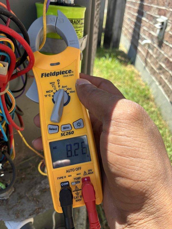 # VIJ - AC Maintenance

Completed annual cooling maintenance and inspection on residential air conditioning system. Customer reported unit running approximately 18 hours daily but maintaining adequate cooling performance. 

Performed comprehensive system evaluation including electrical diagnostics using clamp meter to verify amperage draw and confirm proper compressor operation. All electrical readings measured within normal operating parameters at 0.26 reading observed during testing.

Conducted thorough inspection of attic-mounted air handler and associated ductwork. Verified proper installation of flexible HVAC ductwork and condensate drain lines. Observed adequate attic insulation coverage with vapor barrier protection in place. All mechanical components, refrigerant lines, and PVC condensate piping showed no visible signs of damage or deterioration.

System is operating as designed with no mechanical deficiencies identified. Extended runtime is consistent with current cooling dema