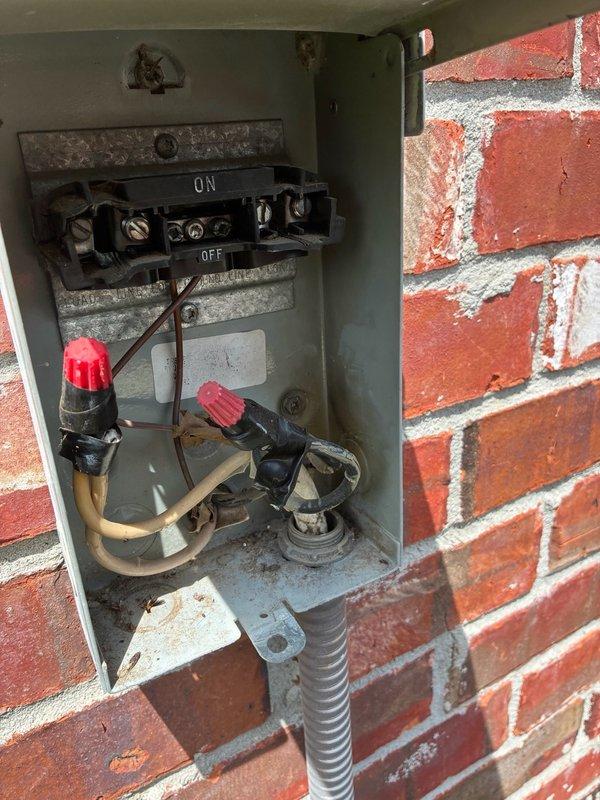 Responded to no-cooling call with indoor temperature at 80 degrees and condenser unit not operating. Upon inspection, diagnosed failed run capacitor preventing compressor operation. Replaced defective capacitor with new TRADEPRO 10 µF 440VAC dual run capacitor. Verified proper electrical connections at disconnect box, tested system operation, and confirmed condenser unit running properly with normal amperage draw and cooling cycle restored.