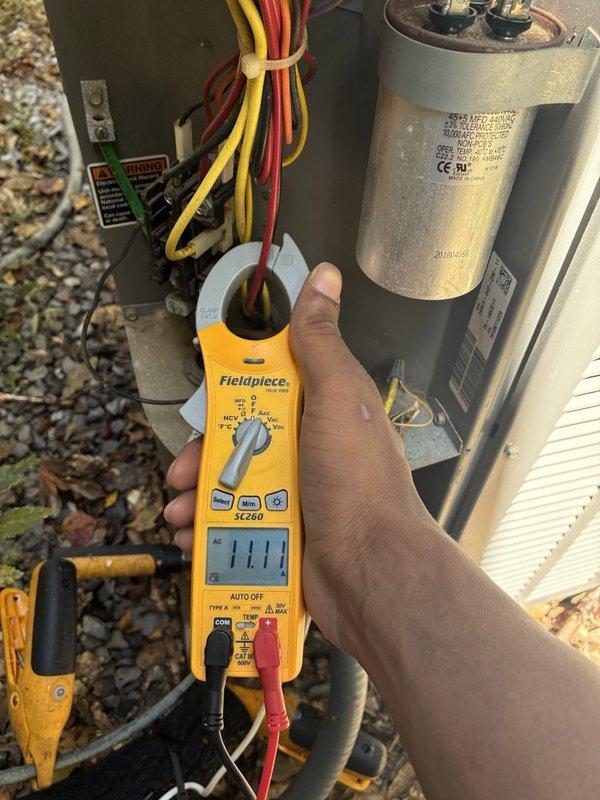 Performed comprehensive AC cleaning and inspection for pre-sale home evaluation. Conducted electrical diagnostics using clamp meter to verify proper amperage draw on system components, inspected and tested capacitor functionality and connections, and documented all findings with detailed photographs for prospective buyer's review.