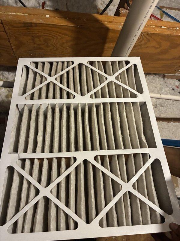 Performed second opinion evaluation of HVAC system following previous service visit. Inspection revealed significant dust and debris accumulation on blower wheel assembly with heavy buildup on vertical fins and slats affecting airflow efficiency. Documented heavily soiled air filters with brown discoloration indicating extended use beyond recommended replacement interval. Photographed system conditions and provided findings to customer for informed decision-making regarding necessary maintenance and repairs.