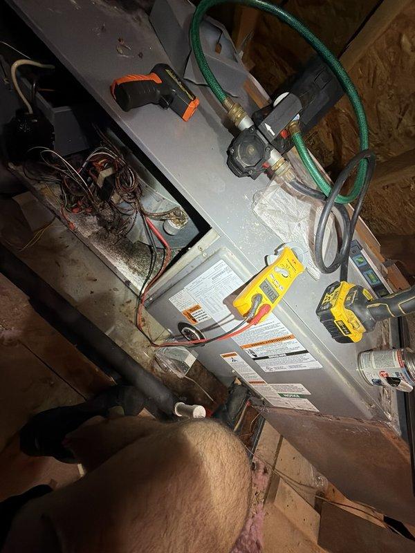 Responded to after-hours dispatch for non-operational upstairs HVAC system in a three-system residence. Upon arrival, accessed attic-mounted air handler unit and performed diagnostic testing using digital multimeter to assess electrical functionality and system operation. Conducted thorough inspection of furnace/air handler, examining control board connections, wiring harness integrity, and manufacturer specifications. Documented equipment conditions and diagnostic findings with photographic evidence for service records.