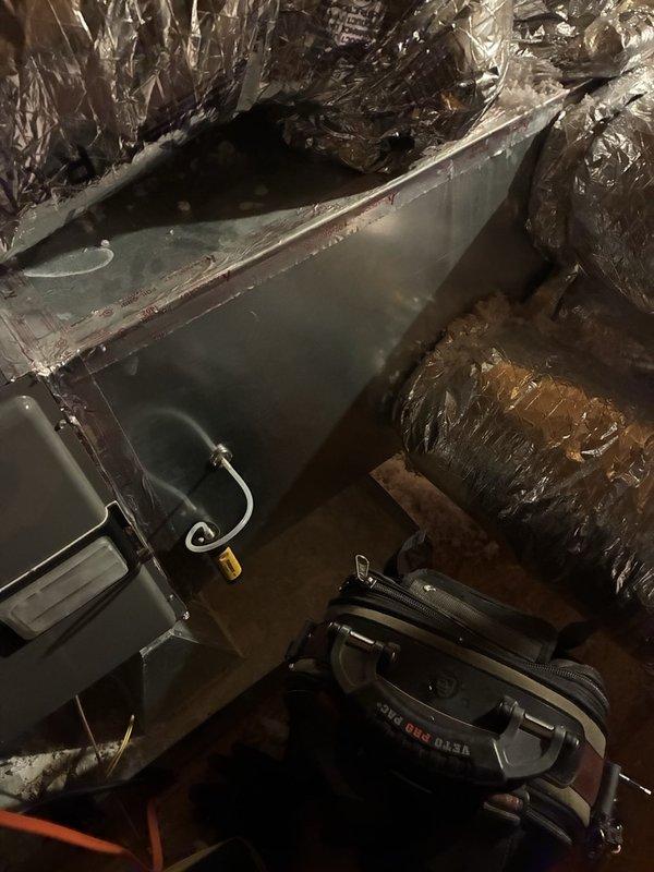 Completed annual AC tune-up and system inspection in attic space. Observed significant condensation accumulation on metal ductwork surfaces, indicating potential insulation deficiency or humidity concerns that may require future attention. Performed standard maintenance procedures, verified system operation, and provided estimate for additional garage ventilation installation as requested.