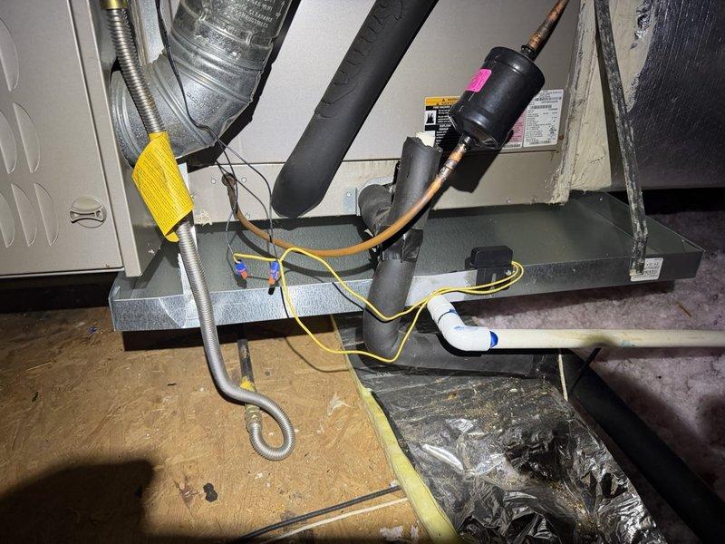 Completed heater tune-up and inspection on two HVAC systems located in attic space. Performed thorough cleaning and operational testing of both units, including inspection of air handler components, refrigerant lines, electrical connections, and drainage systems. Utilized diagnostic equipment to verify proper electrical performance and system functionality, ensuring both heating systems are operating safely and efficiently for the season.