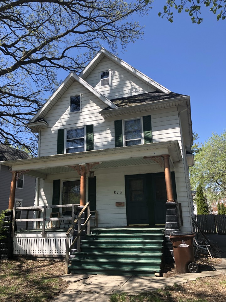 Lansing, MI - Installing new gutters on this home. Lansing, MI - Installing new gutters on this home.