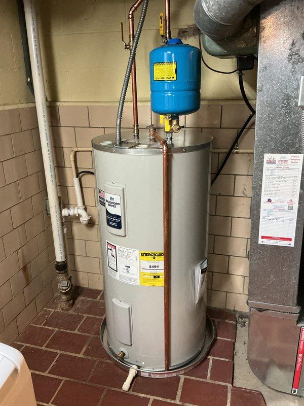 Successfully completed conversion from gas water heater to electric Bradford White automatic storage water heater with expansion tank. Installed new copper piping connections and verified proper functionality of the unit. Coordinated with electrician for electrical connections to ensure safe and compliant installation.