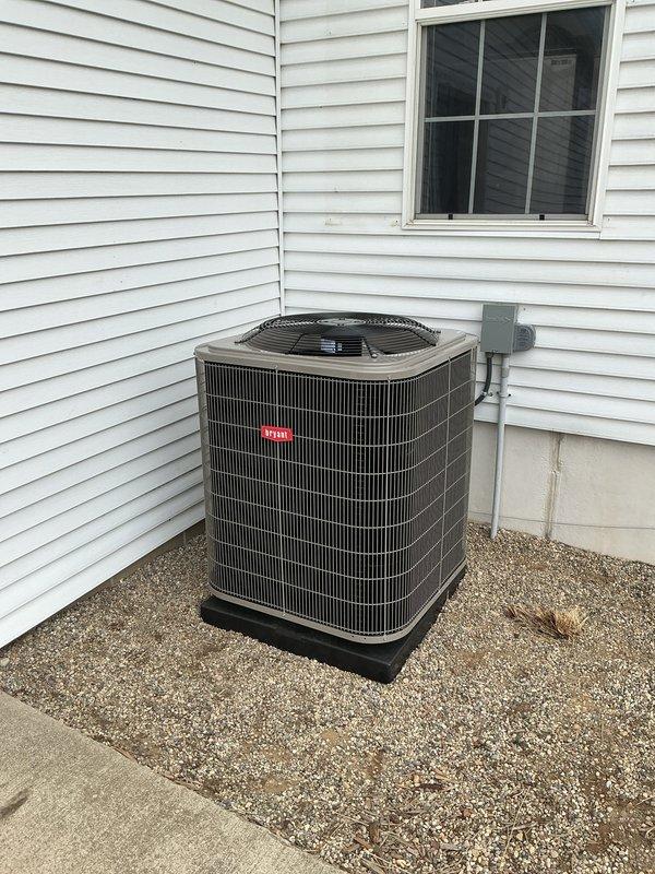 # HVAC Install - Complete System

## Job Description

Successfully completed full HVAC system installation in mobile home, including gas furnace and air conditioning unit. Interior furnace unit installed in main living area with proper clearances maintained from existing wood stove and combustible materials. Unit secured to floor with appropriate mounting, refrigerant lines and electrical connections completed to manufacturer specifications. Exterior Bryant condenser unit positioned on level gravel pad with vibration-dampening base, mounted adjacent to structure with electrical disconnect box installed per code requirements. All refrigerant lines properly insulated, system charged to specifications, and tested for proper operation. Ductwork connections verified, airflow balanced, and thermostat wiring completed. System startup performed with all safety controls and operational parameters confirmed within normal range.