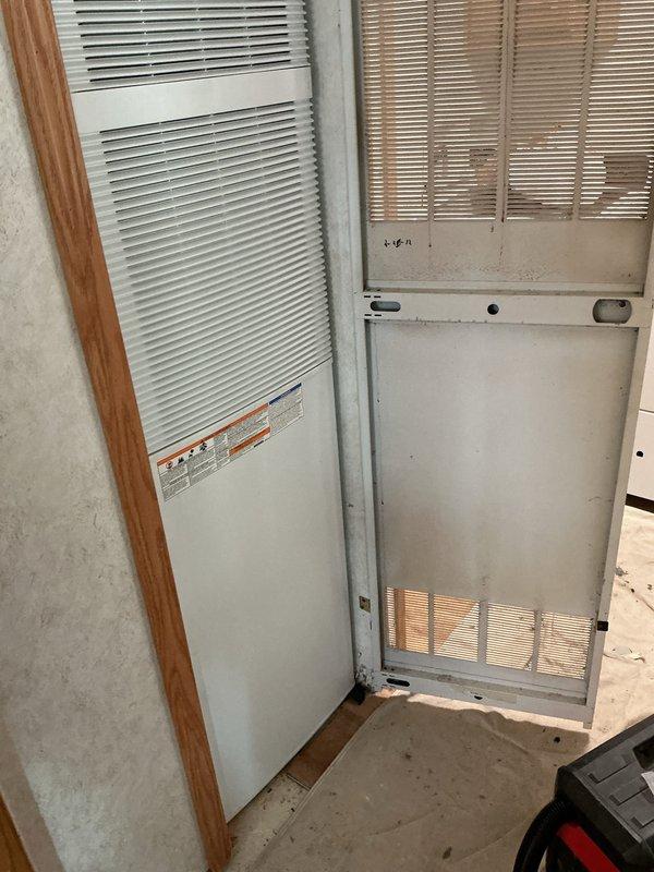 Completed installation of a new gas furnace in a mobile home application. The unit was positioned in a dedicated closet space with proper clearances maintained, all gas connections secured and tested for leaks, and flexible ductwork integrated into the existing HVAC system. The installation included electrical connections, thermostat wiring, and verification of proper airflow through the supply and return louvers, with the system tested and confirmed operational upon completion.