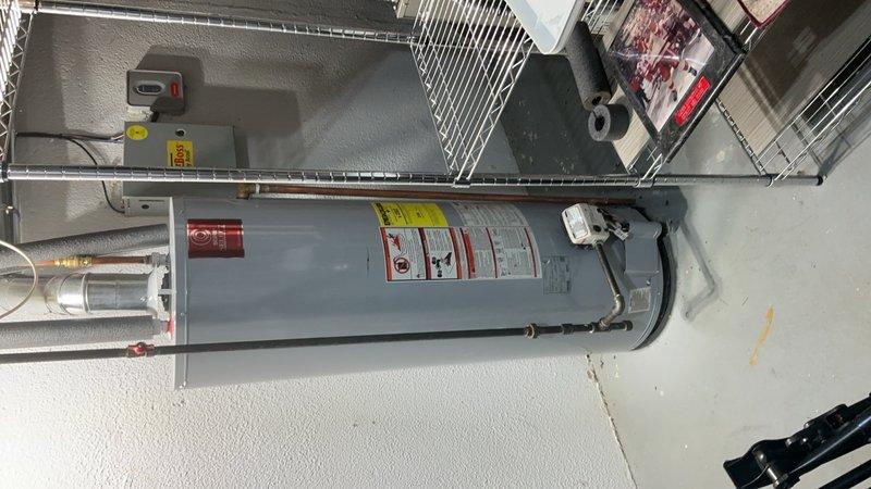 Completed comprehensive maintenance service including hot water tank tune-up and air conditioning system tune-up. Inspected and serviced HVAC ductwork in attic space, verified proper insulation around flexible ductwork and rigid piping components, and confirmed all connections were secure. Performed full inspection and maintenance on water heater unit, checked all plumbing connections, pressure relief valves, and safety systems to ensure optimal operation of both heating and cooling equipment.