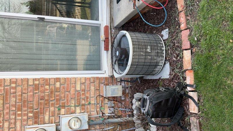 Completed comprehensive evaluation of existing air conditioning system to assess condition and determine if unit replacement is warranted. Performed thorough inspection of outdoor condenser unit, indoor air handler, and associated components. Documented equipment age, operational status, and overall system performance through visual inspection and photographic documentation. Identified that condenser unit shows signs of aging and wear. Discussed findings with customer regarding potential for coordinating replacement with another AC installation project scheduled at separate property. Provided assessment to facilitate decision-making on whether to proceed with system replacement, with option to consolidate both installations for efficiency.