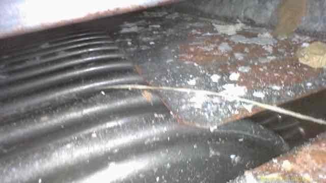 Responded to service call for non-functioning humidifier with gas furnace still operational. Upon inspection, discovered moisture accumulation and potential corrosion on internal ductwork components and humidifier assembly. Examined flexible ductwork in attic space showing debris accumulation and insulation exposure. Inspected air handling unit interior, noting oxidation on metal panels, moisture presence on metallic surfaces, and dust buildup on system components. Documented conditions with photos for records. System assessed and findings reviewed with customer for repair recommendations.