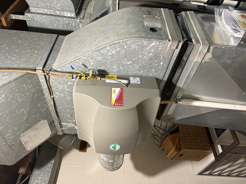 Completed comprehensive AC tune-up on residential HVAC system. Performed standard maintenance inspection of air handler unit and associated ductwork in attic space, verified proper operation of all components, and checked refrigerant lines and connections. System tested and found operating within normal parameters with no issues identified.