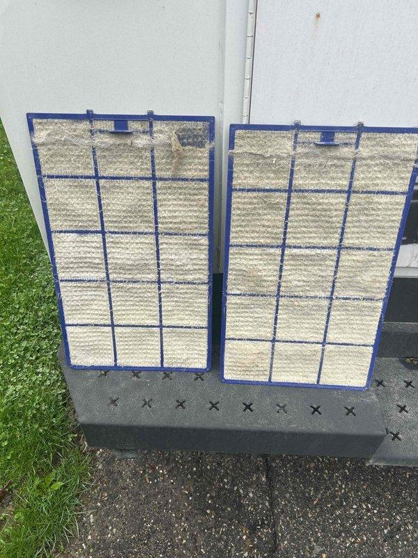 Responded to service call for mini split system not cooling adequately. Upon arrival, performed diagnostic inspection and discovered heavily soiled air filters restricting airflow to the unit. Removed both filters, which showed significant dust and debris accumulation affecting system performance. Replaced dirty filters with new units to restore proper airflow and cooling capacity. System tested and confirmed operating within normal parameters following filter replacement.