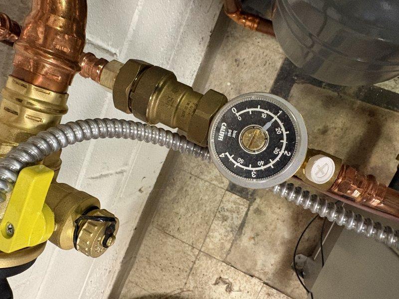 Completed comprehensive boiler tune-up and annual maintenance inspection. System pressure gauge readings were verified and documented, showing normal operating parameters within manufacturer specifications. All copper piping connections, pressure relief valves, and shut-off valves were inspected for proper operation and potential leaks, with no issues identified. Service renewal was processed and next maintenance appointment was scheduled.