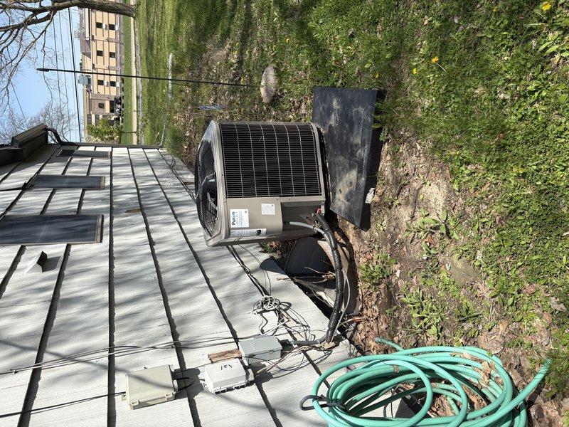 Responded to service call for recently installed condenser unit that was displaced from pad during storm. Repositioned condenser unit back onto concrete pad, ensuring proper placement and levelness. Performed comprehensive system inspection including refrigerant line connections, electrical connections, and operational testing to verify no damage occurred from displacement. Unit confirmed operating within normal parameters with no repairs required.