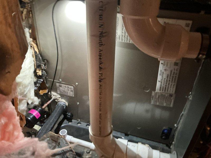 Completed installation of new air conditioning system with matching evaporator coil in attic space. Installed air handler unit, connected refrigerant lines, established proper condensate drainage system with PVC piping and trap, and verified all electrical connections and system controls are operational. System tested successfully with proper airflow and temperature differential confirmed.