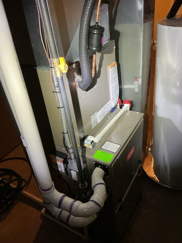 Completed full HVAC system installation including indoor furnace unit with air handler and outdoor condensing unit. Installed and configured all refrigerant lines, condensate drainage system with PVC piping, flexible ductwork with proper insulation, and electrical connections. Performed system startup procedures, verified proper operation of all components, and confirmed refrigerant charge levels meet manufacturer specifications.