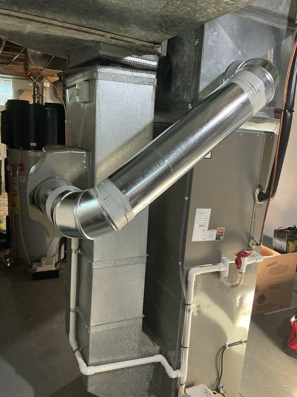 Successfully installed whole-home humidifier unit integrated with existing HVAC system in basement location. Equipment was properly mounted, connected to ductwork with appropriate metallic transitions, and wired to air handler for coordinated operation. System was tested for proper functionality and water supply connections were verified leak-free upon completion.