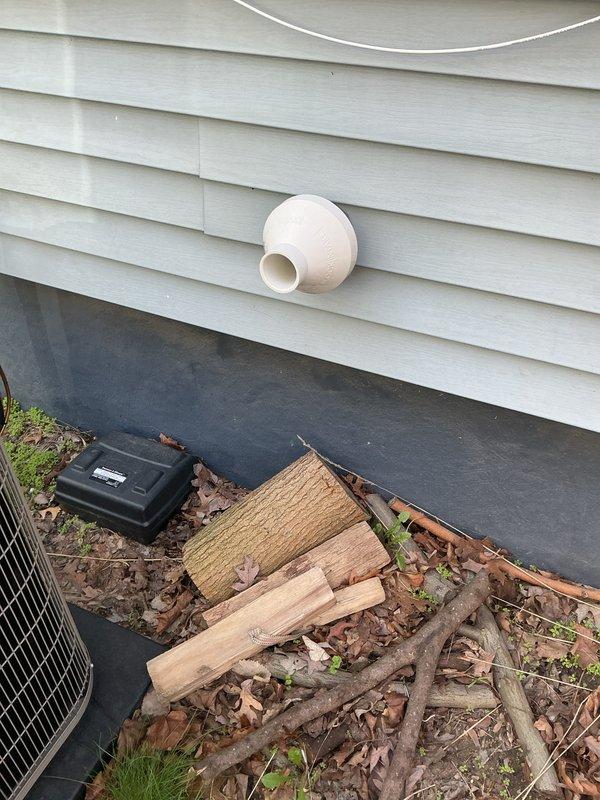 Completed air conditioning system installation and performed initial start-up procedures. Installed outdoor condenser unit on concrete pad with proper clearances, established refrigerant line connections through exterior wall penetration, and verified electrical connections to outdoor disconnect. System was energized, operational parameters were tested and confirmed within manufacturer specifications, and unit was left running properly.