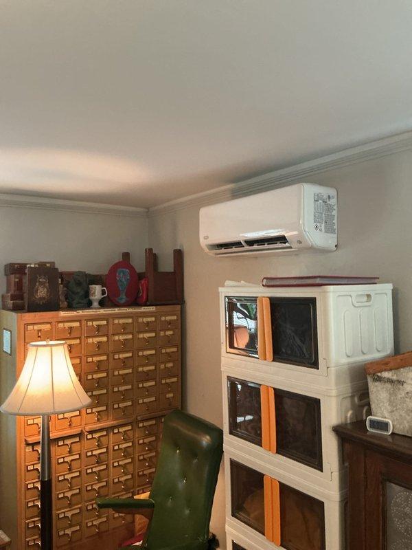 Completed installation of a 2-zone ductless mini-split heat pump system at residential property. Mounted outdoor condenser unit on exterior wall with proper clearances and secured refrigerant line set along building facade using appropriate fasteners and protective covering. Installed indoor wall-mounted air handler units in two separate zones, ensuring proper placement for optimal airflow distribution and aesthetic integration with existing interior spaces. Ran electrical connections to exterior junction box and completed all refrigerant line connections between outdoor and indoor units. System was pressure tested, evacuated, and charged to manufacturer specifications. Performed full operational testing of both zones to verify heating and cooling functions, confirming proper communication between indoor units and outdoor condenser.