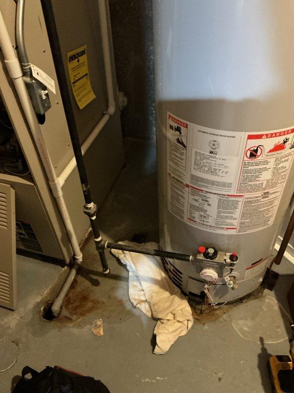 Responded to service call for water heater with pilot light failure. Upon inspection, diagnosed issue with pilot assembly on conventional tank-style water heater located in utility room. Performed necessary repairs to restore hot water operation, including pilot light system troubleshooting and component adjustment. Unit tested and verified operational before departure.