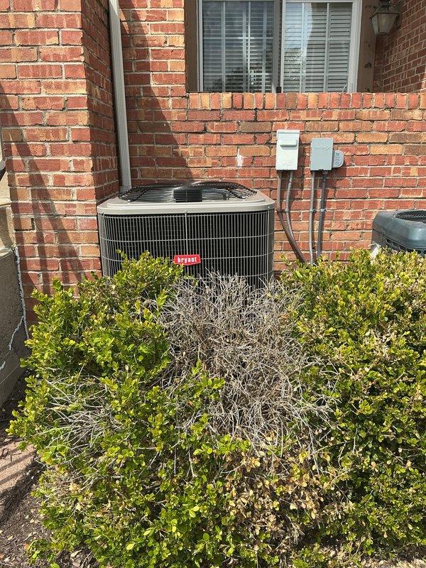 # HVAC System Installation

Successfully completed installation of a new Bryant furnace and air conditioning system. The indoor installation included mounting the furnace unit in the utility closet, connecting the evaporator coil assembly with refrigerant lines, and integrating the system with existing ductwork. All PVC drainage piping was properly routed and secured for condensate removal. The outdoor condensing unit was positioned on a ground-level pad against the exterior brick wall with appropriate clearance for airflow. Electrical connections were established through exterior junction boxes with conduit running to the unit. Refrigerant lines were run from the indoor coil to the outdoor condenser and the system was charged to manufacturer specifications. All connections were pressure tested for leaks and system operation was verified across heating and cooling modes. Equipment was left running efficiently with all safety controls functioning properly.