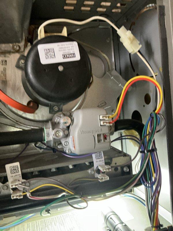 Completed comprehensive tune-up service on both the gas furnace and air conditioning system. Inspected all major components including the Honeywell control board, pressure switch assembly, and electrical connections within the furnace cabinet. Verified proper operation of the Lennox furnace unit, checked all safety controls, and confirmed gas line connections and pressure readings were within manufacturer specifications.