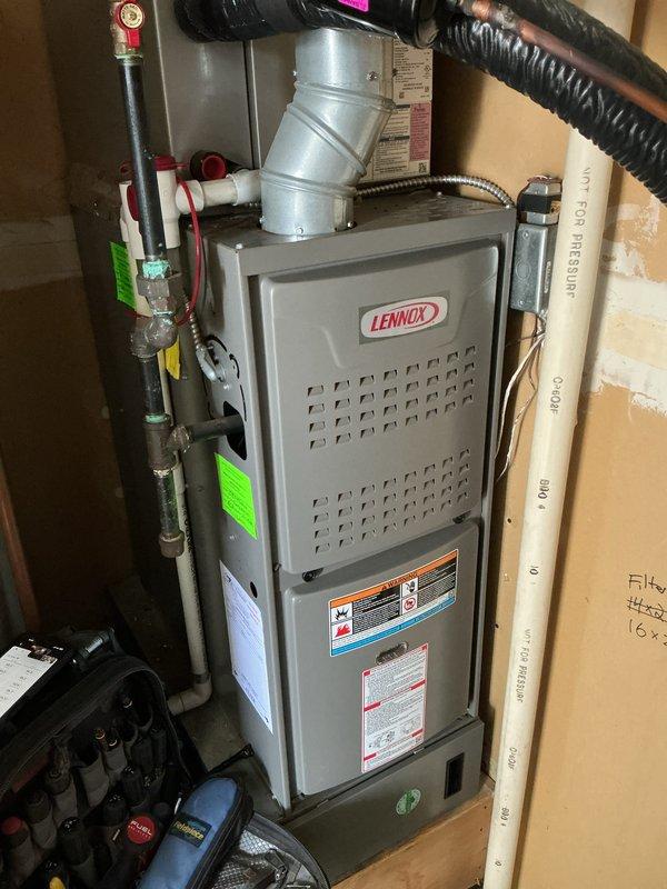 Completed comprehensive tune-up service on both the gas furnace and air conditioning system. Inspected all major components including the Honeywell control board, pressure switch assembly, and electrical connections within the furnace cabinet. Verified proper operation of the Lennox furnace unit, checked all safety controls, and confirmed gas line connections and pressure readings were within manufacturer specifications.