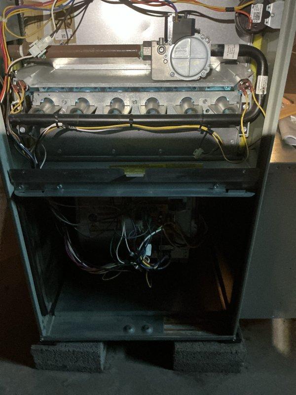 Completed gas furnace cleaning and maintenance on residential heating unit. Accessed and inspected burner assembly, gas valve, ignition system, and internal components. Cleaned burner tubes, verified proper operation of control board and wiring connections, and documented equipment condition with photographic records. Renewed service membership for continued maintenance coverage.