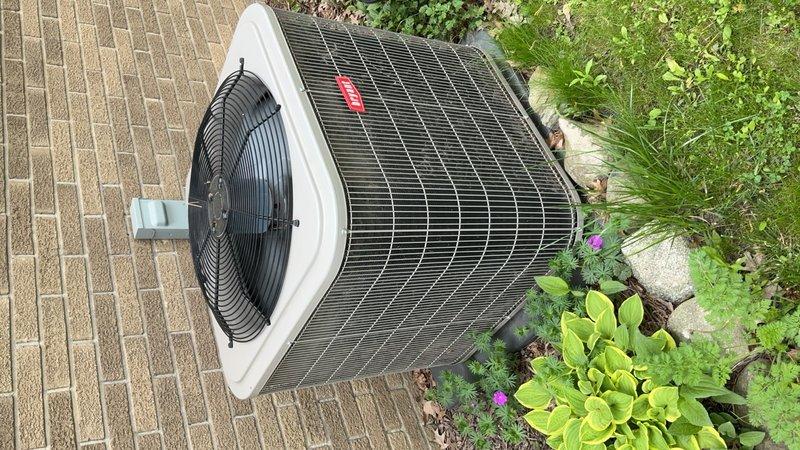 Performed comprehensive tune-up on outdoor condensing unit, including inspection of compressor, fan motor, and electrical connections. Verified proper operation of condenser coils with horizontal louvers, checked refrigerant lines and wiring harness, and confirmed fan assembly function. Unit operating within normal parameters upon completion of preventive maintenance service.