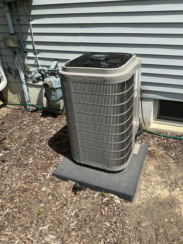 Completed comprehensive air conditioning tune-up on outdoor condenser unit. Performed full system inspection, cleaned condenser coils, checked refrigerant levels, tested electrical connections and capacitor, verified proper airflow through fan assembly, and ensured disconnect box functionality. Unit operating within manufacturer specifications with no issues identified.