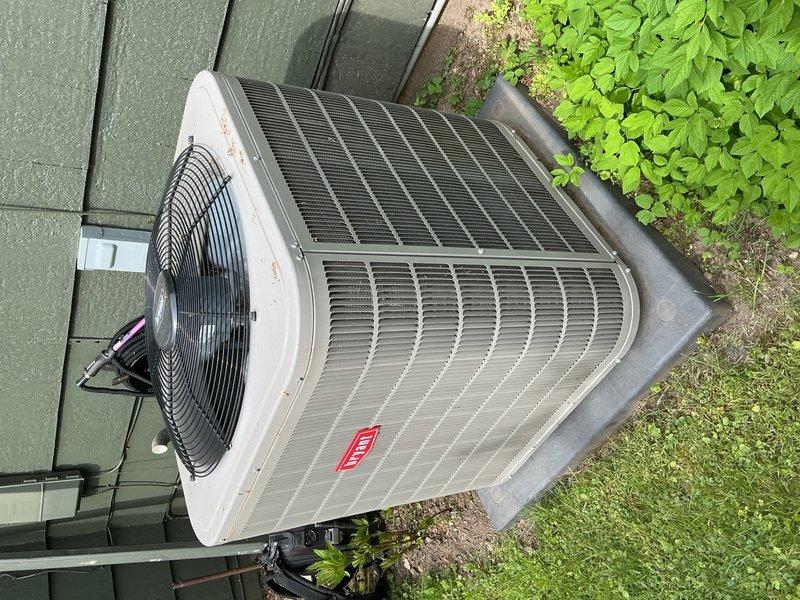 Arrived on-site but was unable to complete the scheduled air conditioning tune-up maintenance service during this visit. Outdoor condenser unit was visually inspected and photographed, showing unit in good operating condition with clean exterior surfaces, intact louvered panels, and properly maintained fan grille. Follow-up appointment will be required to complete full preventative maintenance service.