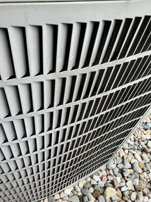 Completed comprehensive air conditioning tune-up on outdoor condensing unit. Performed standard preventative maintenance inspection, verified proper airflow through louvered panels, and confirmed fan operation. Unit found in good working condition with all components functioning within normal parameters.