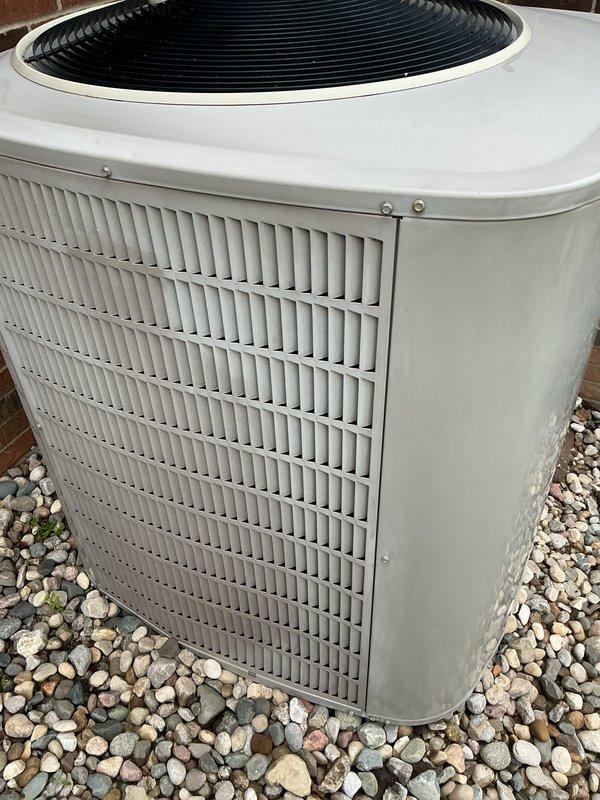 Completed comprehensive air conditioning tune-up on outdoor condensing unit. Performed standard preventative maintenance inspection, verified proper airflow through louvered panels, and confirmed fan operation. Unit found in good working condition with all components functioning within normal parameters.
