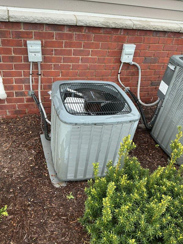 Completed membership air conditioning tune-up service on dual outdoor condensing units. Performed comprehensive preventive maintenance inspection including cleaning condenser coils, checking refrigerant levels, testing electrical connections, verifying proper airflow through fan assemblies, and ensuring all safety disconnects were functioning correctly. Both units operating within normal parameters with no deficiencies noted at time of service.