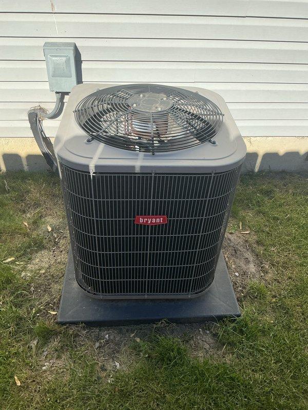 Completed annual air conditioning tune-up and maintenance on Bryant brand outdoor condenser unit. Performed comprehensive system inspection, verified proper operation of all components including compressor, condenser fan motor, and electrical connections at disconnect box. Unit found in good operational condition with no visible signs of damage or deterioration to exterior components.