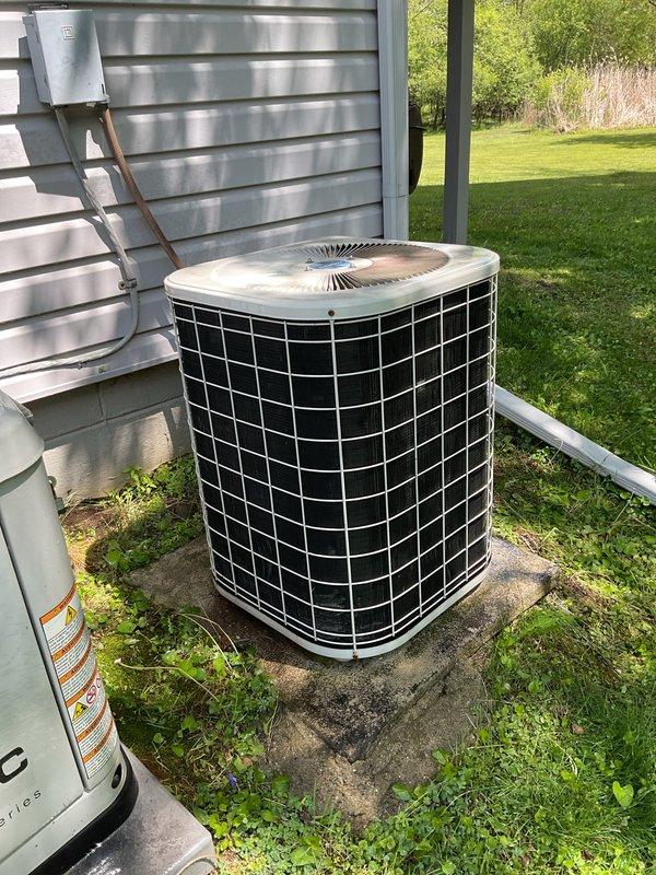 Performed routine air conditioning tune-up on residential outdoor condensing unit. Completed standard preventive maintenance procedures including system inspection, refrigerant line evaluation, and verification of proper unit operation. Unit found in normal operating condition with appropriate seasonal performance for cooling system.