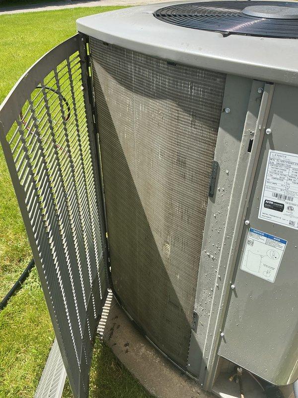 Performed comprehensive AC tune-up on 2022 residential unit as part of prepaid maintenance agreement. Inspected outdoor condenser unit, which showed moderate accumulation of dirt, dust, and organic debris on exterior panels and intake areas. Opened access panel to examine filter screen, noting typical dirt buildup consistent with normal operation. Completed standard maintenance procedures including visual inspection of all accessible components, fan grille assessment, and verification of unit specifications. System operational and ready for cooling season.