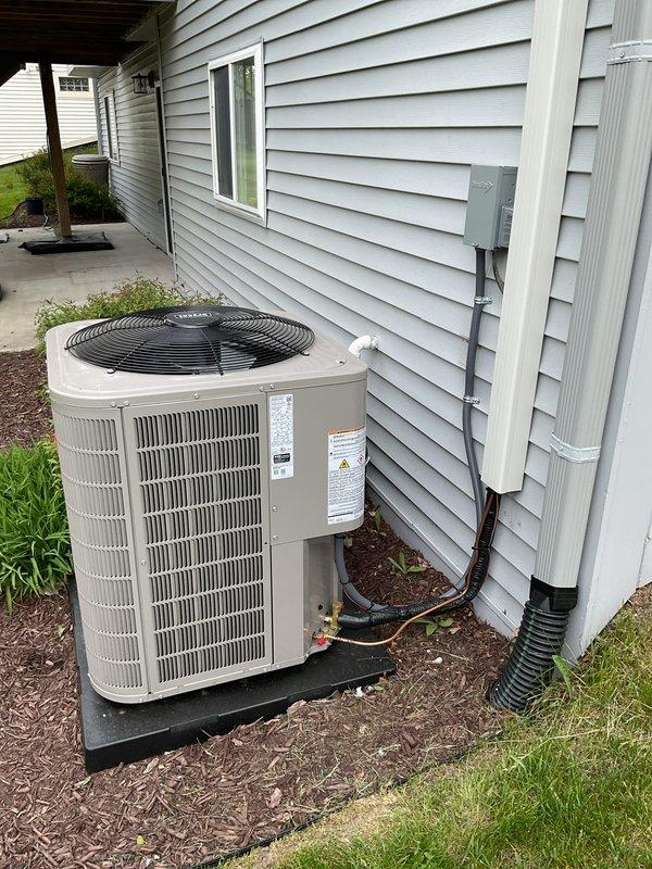 Completed system start-up for newly installed furnace and air conditioner. Replaced faulty pressure switch that was identified during initial installation, collected payment, and verified all system components operating within manufacturer specifications. Exterior condensing unit and PVC venting properly installed and functional.