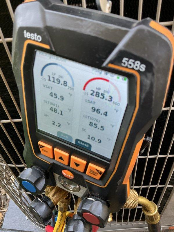 Completed AC system start-up and commissioning on residential HVAC unit. Utilized Testo 558s digital manifold gauge to verify refrigerant pressures, temperatures, and system performance parameters, confirming all readings within manufacturer specifications. System operating properly with no deficiencies noted.
