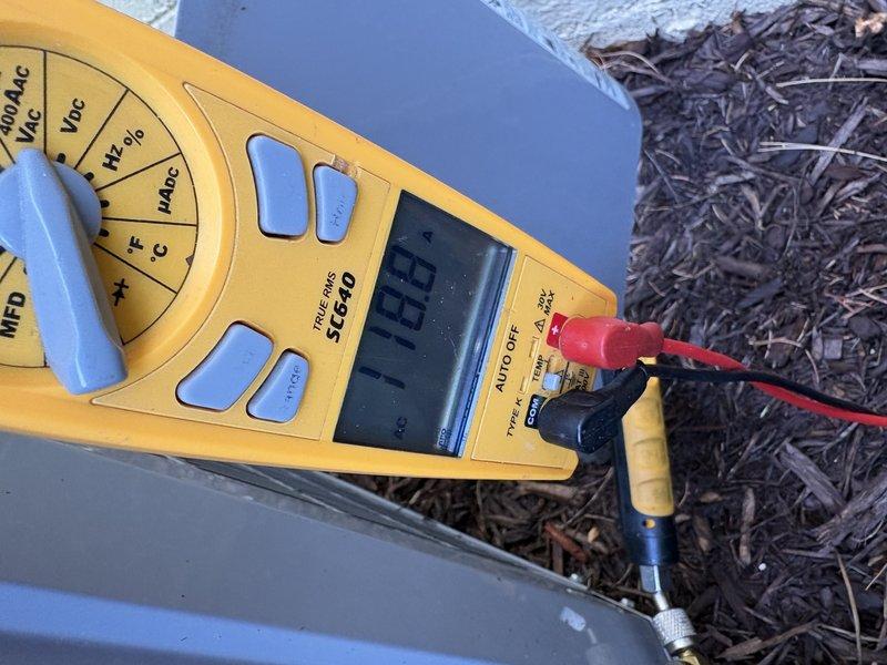 Performed comprehensive AC tune-up and system evaluation. Conducted electrical diagnostics using digital multimeter, measuring amperage draw and voltage readings at outdoor condensing unit to verify proper compressor operation and electrical performance within manufacturer specifications. All measurements indicated normal system operation with no electrical anomalies detected.