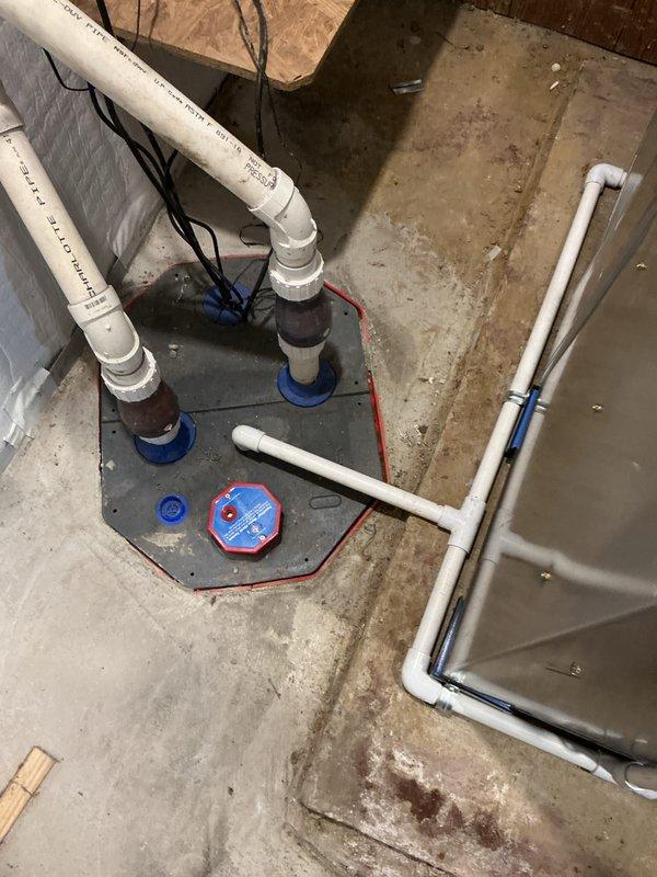 Completed full HVAC system installation including new furnace, air conditioner, and humidifier in basement utility space. Successfully performed system start-up procedures, verified all equipment operational parameters, and confirmed proper drainage connections through foundation with appropriate sealing and grommets.