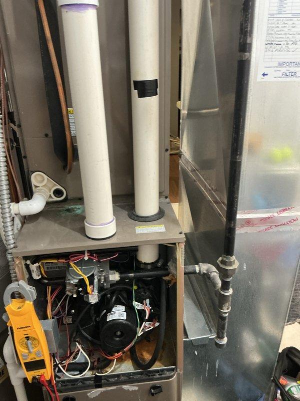 Completed comprehensive AC and furnace tune-up maintenance service on residential HVAC system. Performed thorough inspection of indoor air handler unit, tested electrical connections and components with multimeter, verified proper airflow through filter system, and inspected condensate drainage lines. Conducted outdoor condenser unit evaluation including capacitor testing, fan motor operation verification, and electrical connection inspection to ensure system is operating efficiently for the upcoming cooling season.