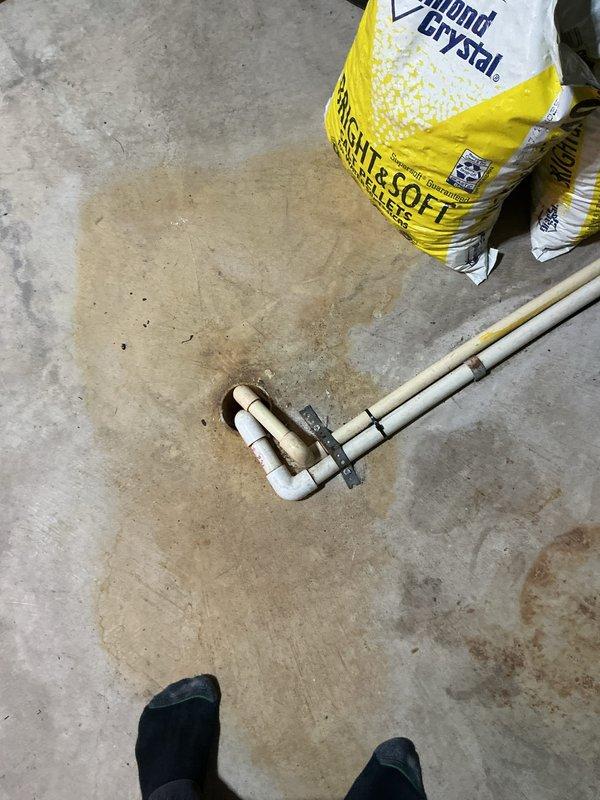 Completed air conditioning system installation and performed initial start-up procedures. Installed condensate drain line with proper P-trap configuration and exterior discharge piping, ensuring adequate drainage and code compliance. Verified all refrigerant connections, tested system operation, and confirmed proper cooling function upon start-up.