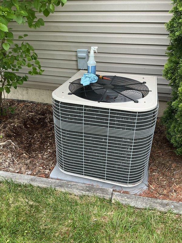 Responded to no cooling complaint on 20+ year old residential air conditioning system. Performed diagnostic inspection of outdoor condensing unit and associated electrical components. Documented existing equipment condition with photos showing aged wiring connections, refrigerant lines, and exterior condenser unit with significant wear. Discussed repair versus replacement options with customer, who scheduled follow-up appointment for further evaluation and potential system replacement.
