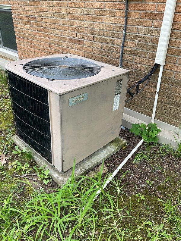 Completed comprehensive air conditioning tune-up and preventive maintenance on older Lennox outdoor condensing unit. Performed standard seasonal maintenance procedures including system inspection, cleaning, and performance verification to ensure proper cooling operation for the upcoming season.